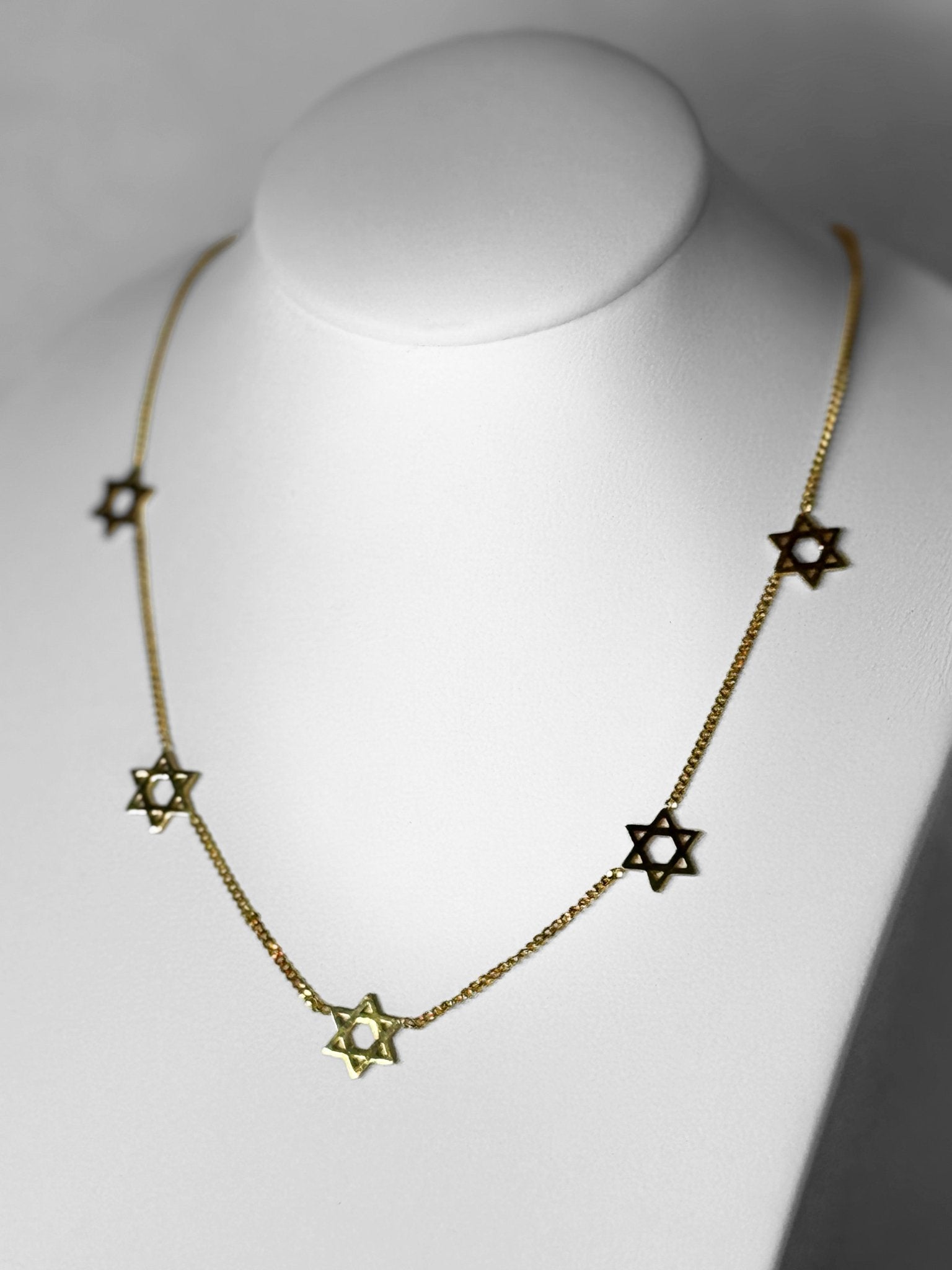 Necklace - Magen David array - gold